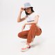 dámske tričko NEW BALANCE TRIČKO NB ESSENTIALS STACKED LOGO TEE wt91546mlt farba biela
