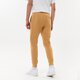 pánske nohavice NIKE NOHAVICE  SPORTSWEAR CLUB FLEECE bv2671-722 farba horčicová