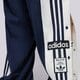 dámske nohavice ADIDAS NOHAVICE  ADIBREAK PANT jd0853 farba tmavomodrá