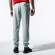 pánske nohavice FILA NOHAVICE  KUDDUSI PANTS 687218b13 farba sivá