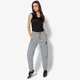 dámske nohavice NIKE NOHAVICE  W NSW RALLY PANT REG 894850-091 farba sivá