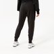 pánske nohavice NEW BALANCE NOHAVICE  NB ESSENTIALS STACKED LOGO SWEATPANT mp03558bk farba čierna