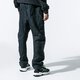 pánske nohavice NIKE NOHAVICE  M NSW TCH PCK PANT WVN QLTD bv4639-010 farba čierna