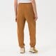 dámske nohavice PUMA NOHAVICE  PUMA INFUSE SWEATPANTS 535644-74 farba horčicová