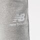 pánske nohavice NEW BALANCE NOHAVICE  NB ESSENTIALS STACKED LOGO SWEATPANT mp03558ag farba sivá