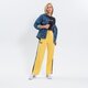 dámske nohavice ELLESSE NOHAVICE  ATER TRACK PANT YELLOW sgk12166606 farba žltá