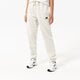 dámske nohavice NEW BALANCE NOHAVICE  NB ESSENTIALS UNI-SSENTIALS SWEATPANT up21500sah farba sivá
