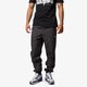 pánske nohavice NIKE NOHAVICE  SWEEPER CUFF PANT 644841060 farba sivá