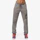 dámske nohavice NIKE NOHAVICE  RALLY PANT-LOGO 684123091 farba sivá